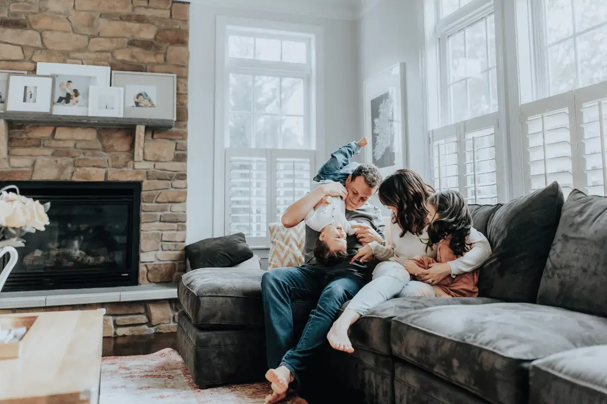 Happy family enjoying comfortable home climate